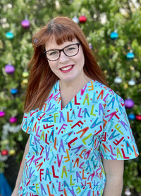 Falalalala scrub top