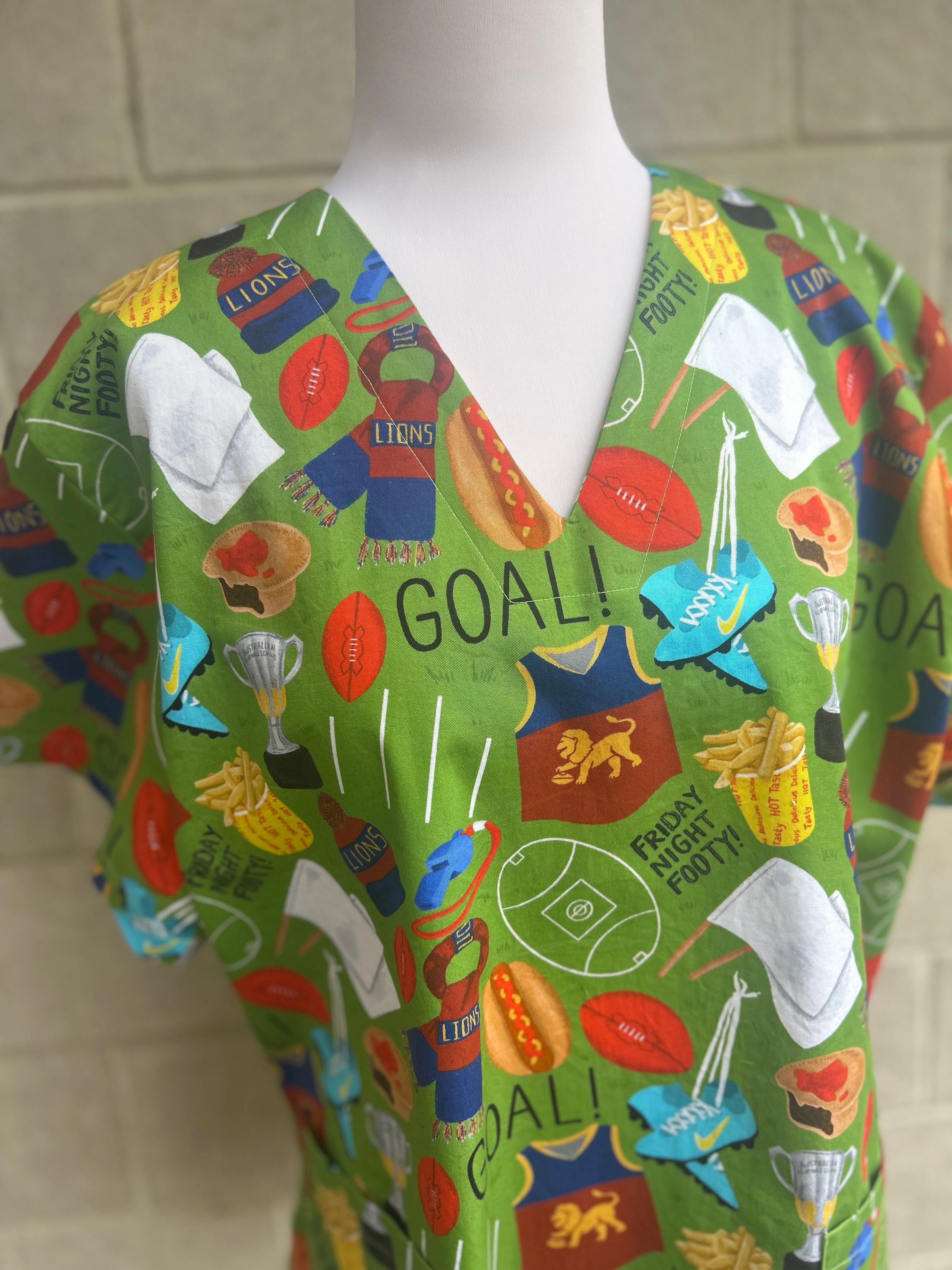 Brisbane Lions scrub top (XS or S only)