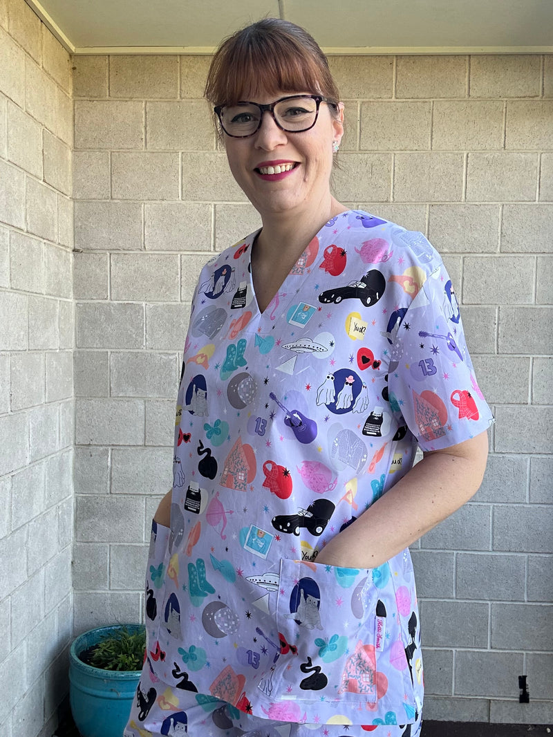 Eras scrub top