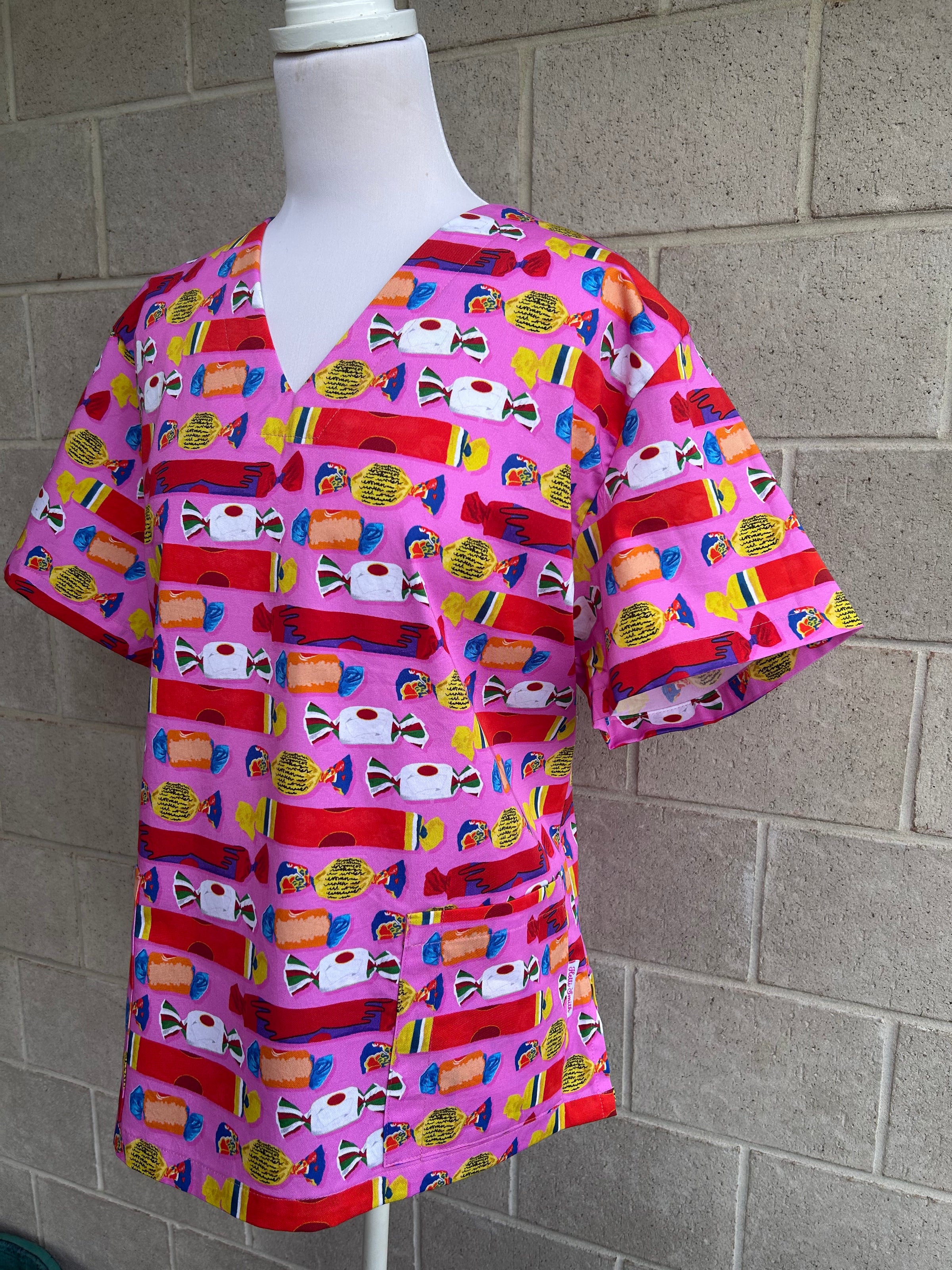 Wrapped lollies pink scrub top (size XS-M only)