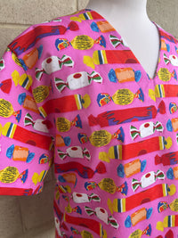 Wrapped lollies pink scrub top (size XS-M only)