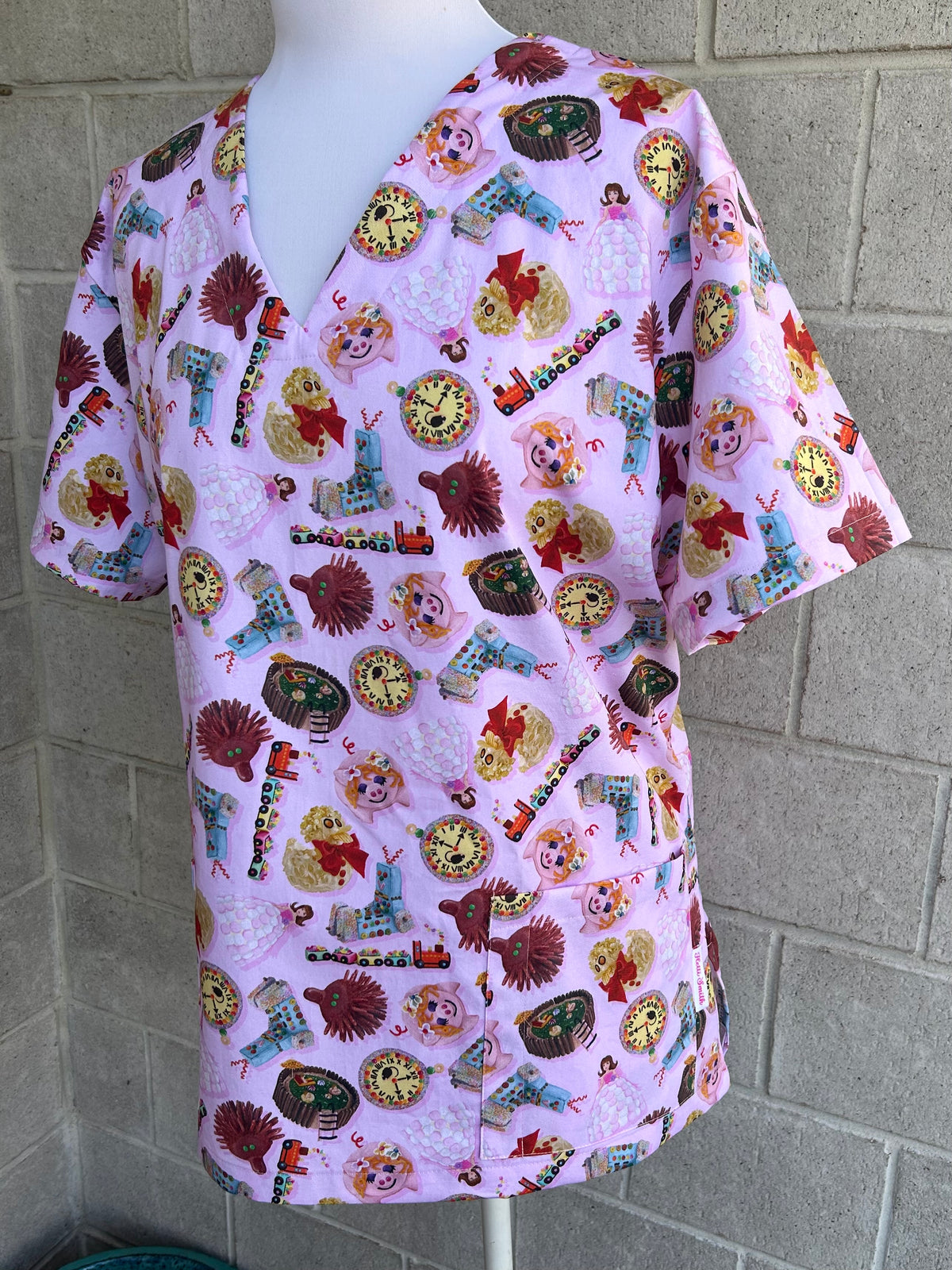 Woman’s Weekly Birthday Cakes scrub top (In stock, made to order)