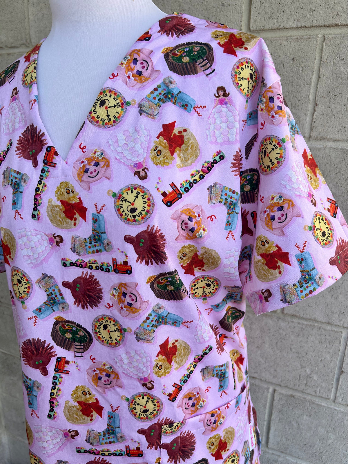 Woman’s Weekly Birthday Cakes scrub top (In stock, made to order)