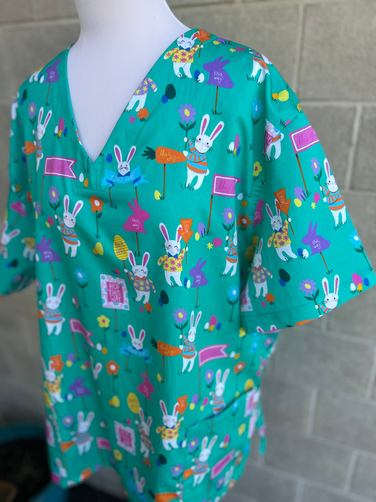 Easter egg hunt scrub top (one left: size XS-XL only)