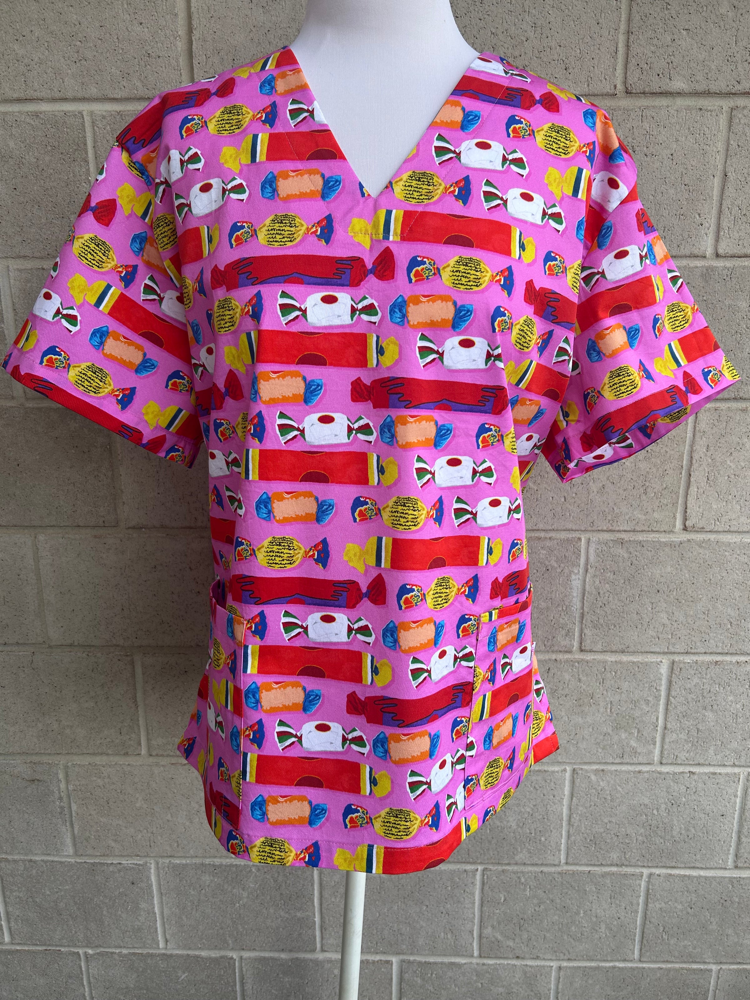 Wrapped lollies pink scrub top (size XS-M only)