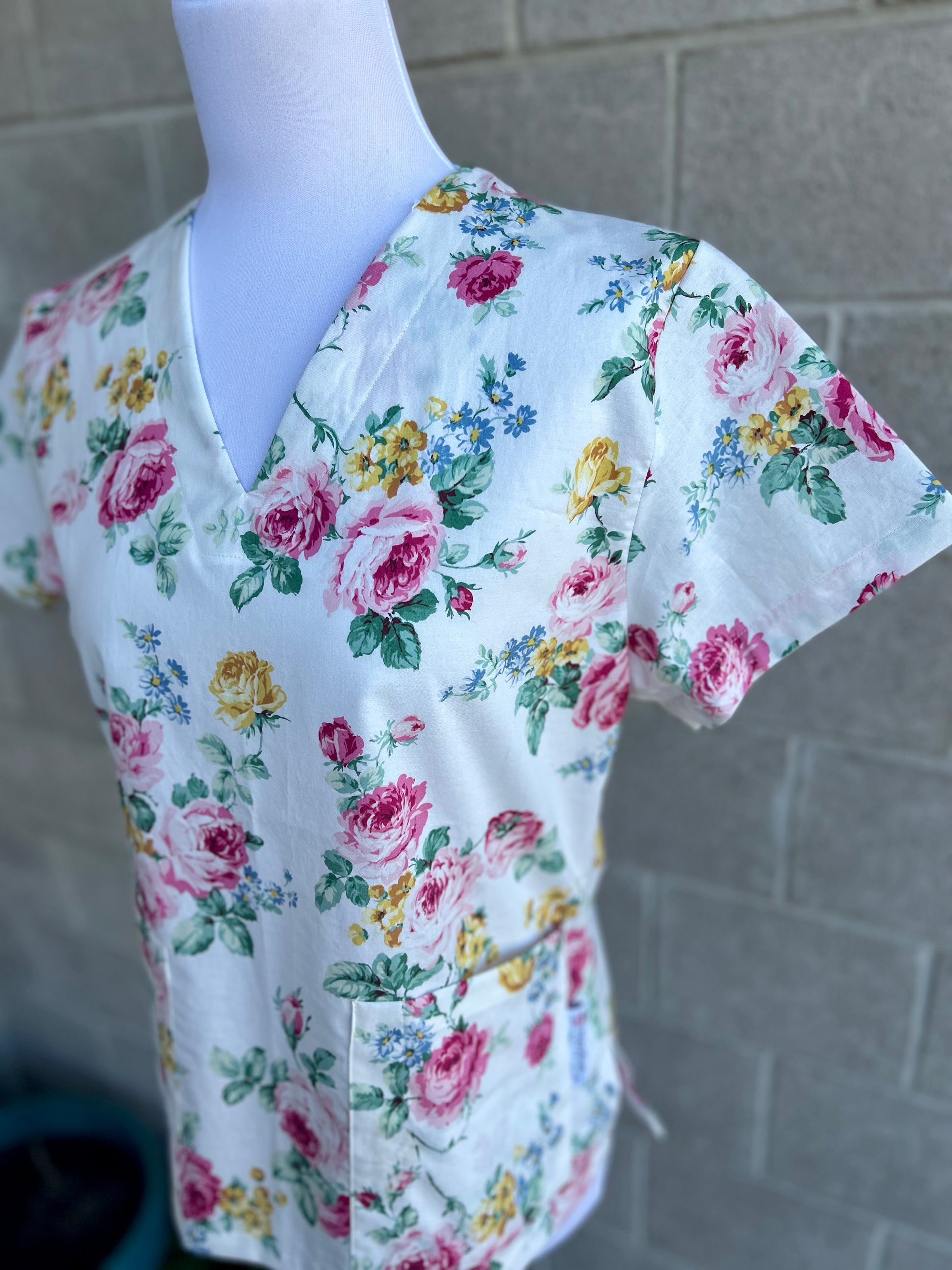 Cream floral scrub top