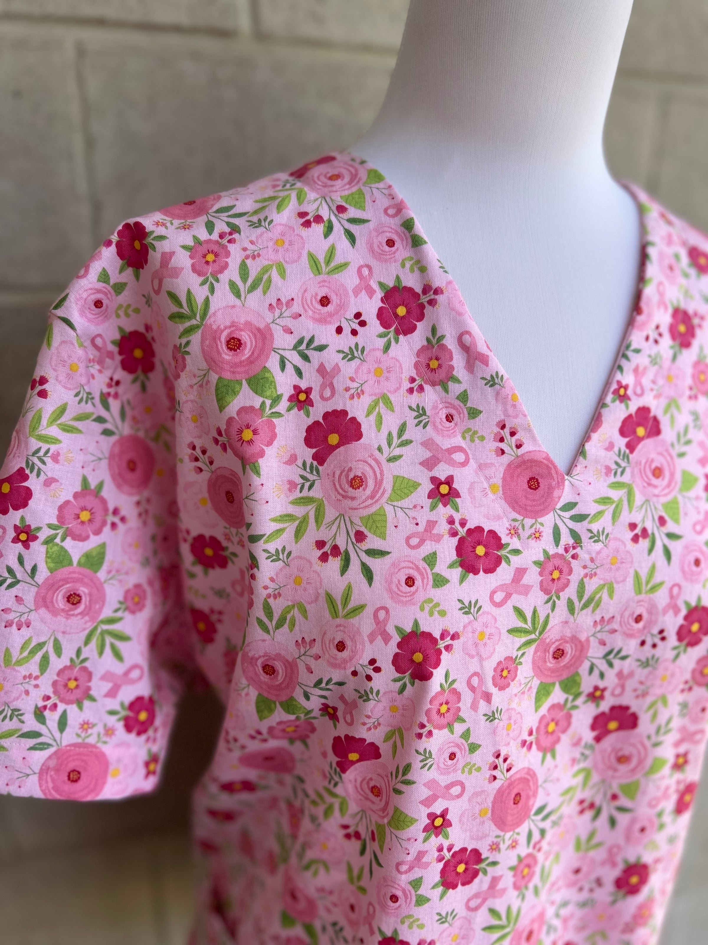 Strength in pink floral scrub top (2 colour options)