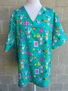 Easter egg hunt scrub top (one left: size XS-XL only)