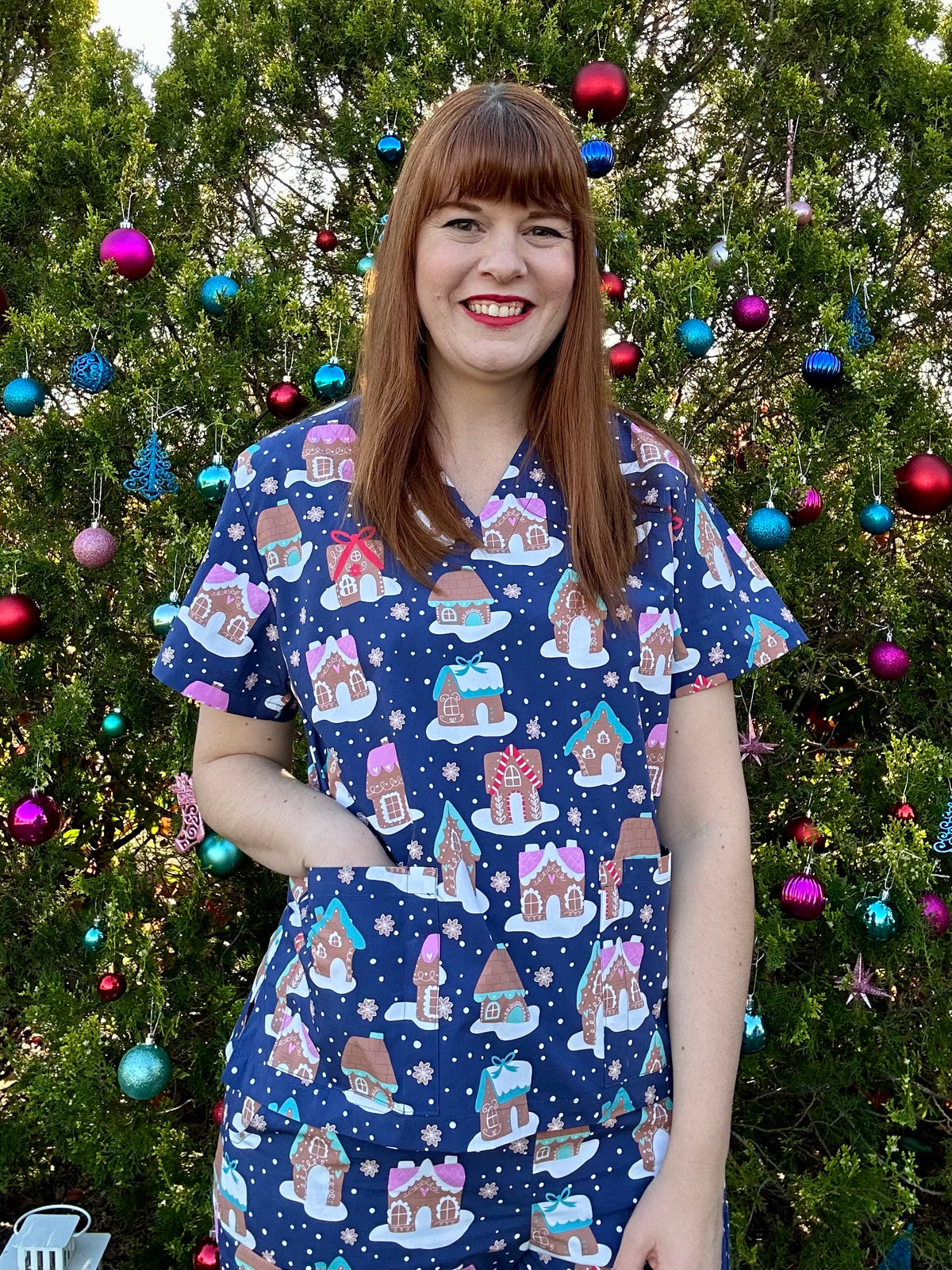 Gingerbread village scrub top