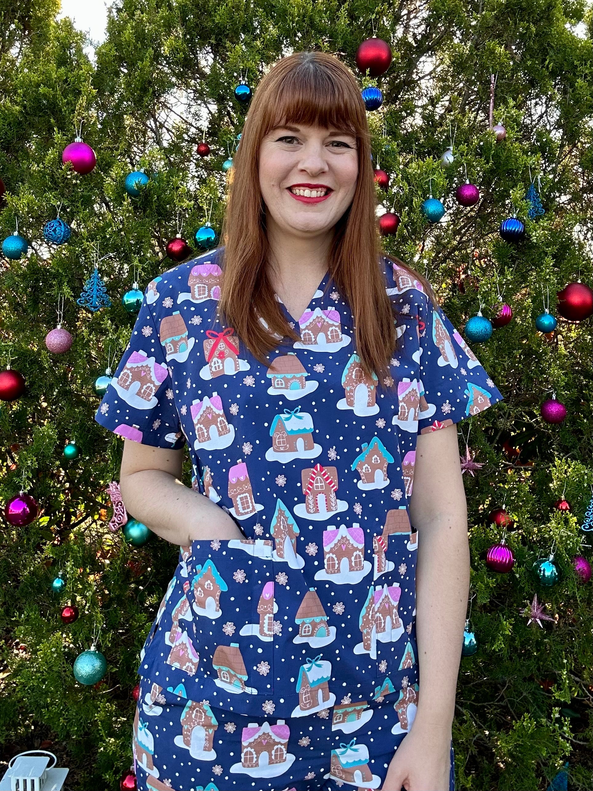 Gingerbread village scrub top