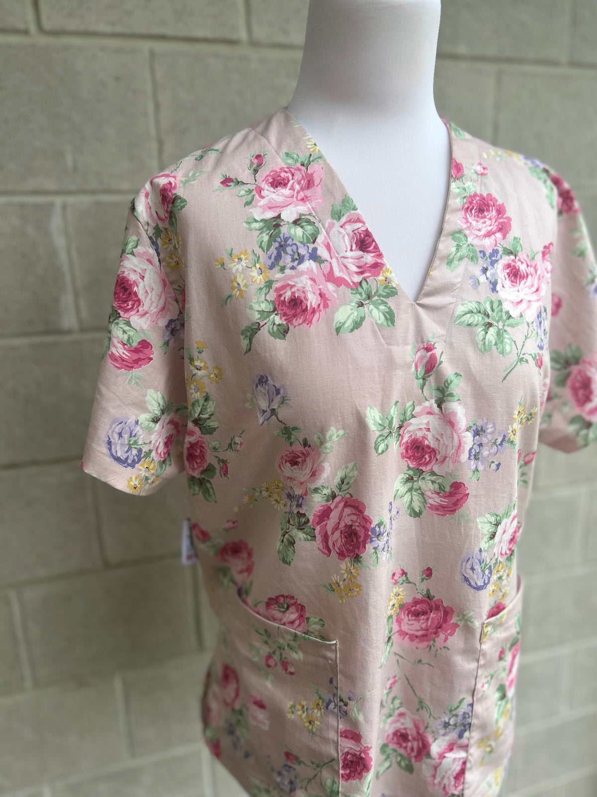 Dusty pink floral Scrub top.