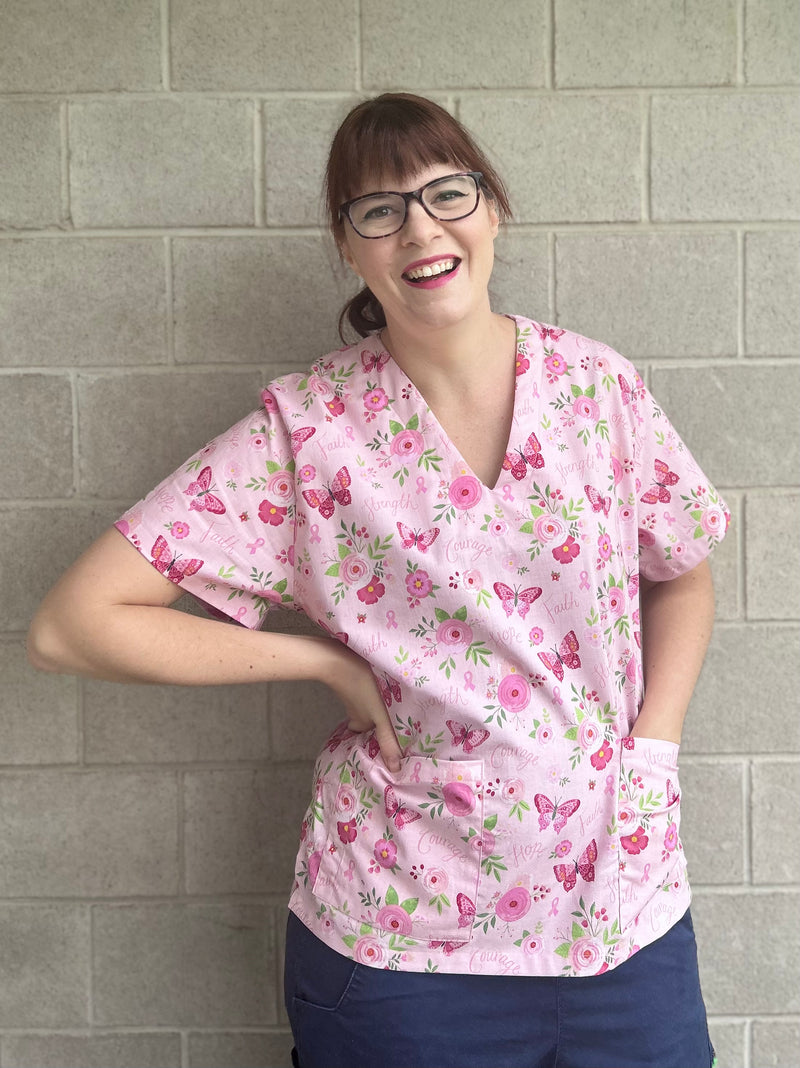 Strength in pink scrub top (XS only)