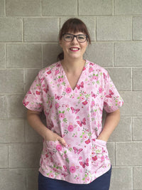 Strength in pink scrub top (XS only)